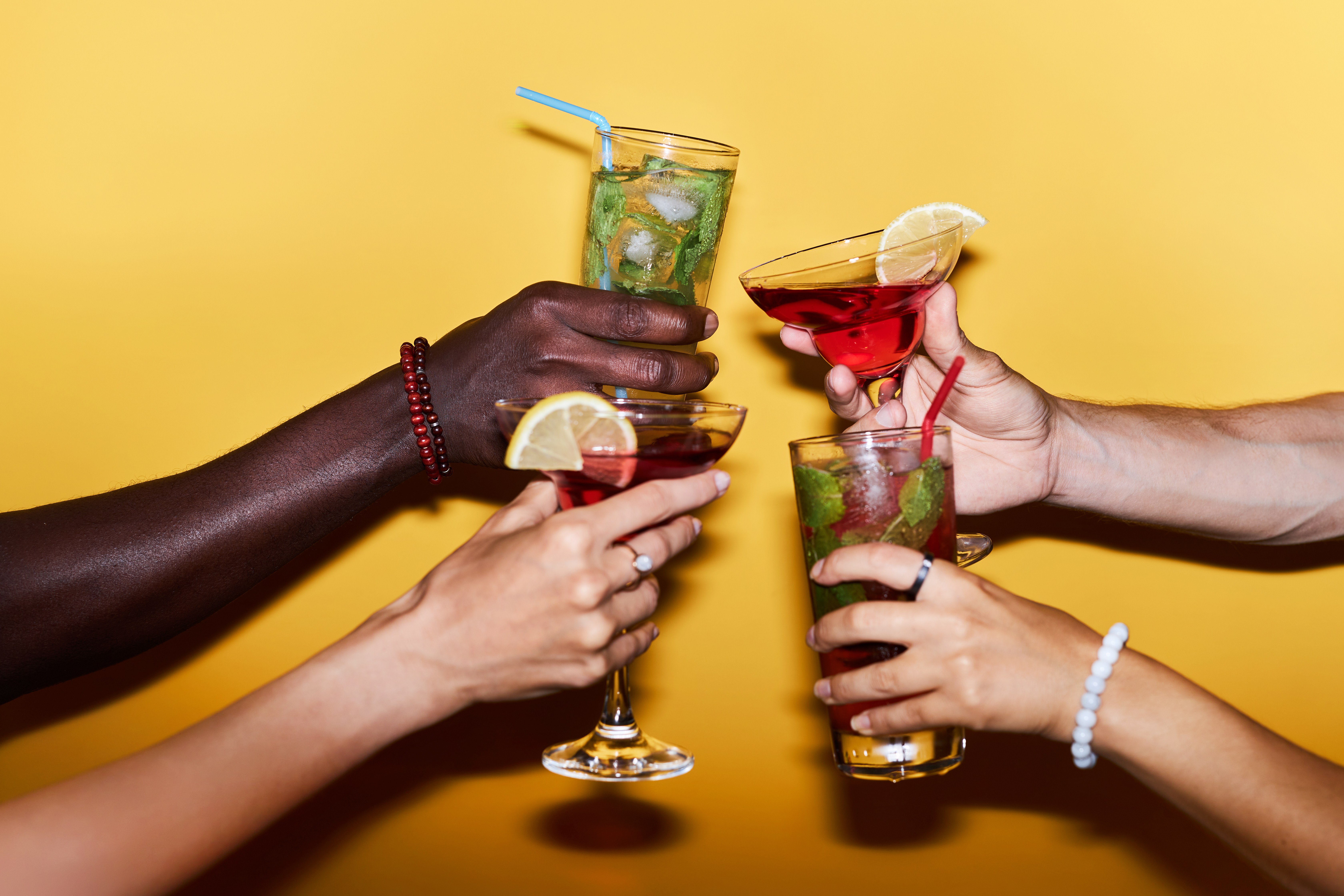 People toasting with alcohol-free cocktails
